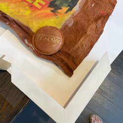 The Moog Gallery & Custom Framing - Trying out a frame sample at moon gallery.