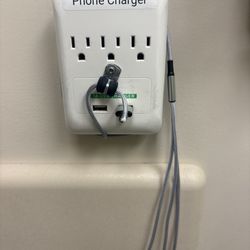 Patient First Primary & Urgent Care - Bowie - Phone charger in room