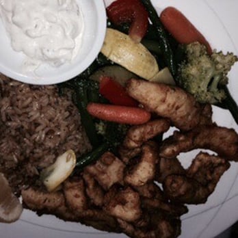 Leo's - fish with harvest blend rice and veggies - Seafood Near Me - Grand Rapids, Michigan