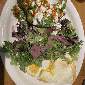 Tupelo Honey - Avocado Toast & Eggs. The Siracha honey sauce was amazing - Southern Near Me - Franklin, Tennessee Tupelo Honey - Avocado Toast & Eggs. The Siracha honey sauce was amazing - Southern Near Me - Franklin, Tennessee