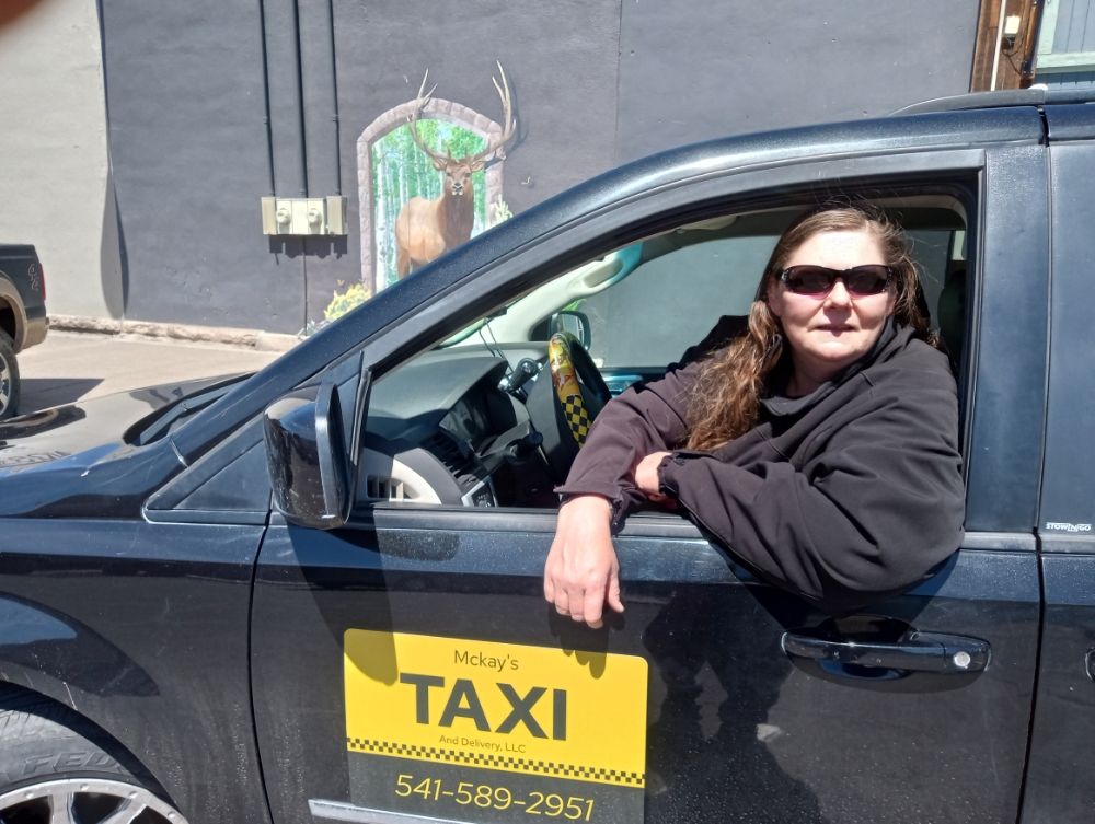 Mckay's Taxi and Delivery Logo