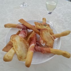 Al Terrazzo - Prosciutto wrapped breadsticks.