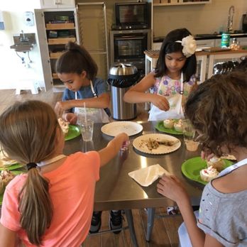 Taste Buds Kitchen - Adding sprinkles to the vanilla cupcakes and the Zucchini Fries almost eaten! - Cooking Classes Near Me - Miami, Florida Taste Buds Kitchen - Adding sprinkles to the vanilla cupcakes and the Zucchini Fries almost eaten! - Cooking Classes Near Me - Miami, Florida