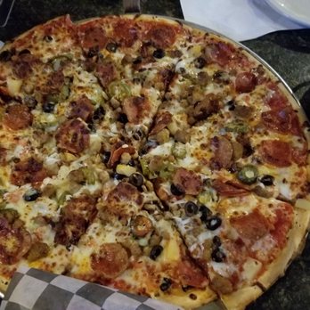 Mulligan's Pub - Mulligan's loaded pizza - Pubs Near Me - Wichita, Kansas Mulligan's Pub - Mulligan's loaded pizza - Pubs Near Me - Wichita, Kansas
