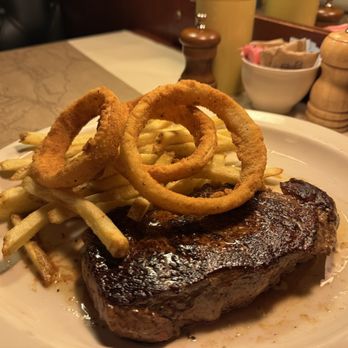 Ted's Montana Grill - New York Strip Side: 1/2 fries & 1/2 onion rings - Burgers Near Me - Aurora, Colorado Ted's Montana Grill - New York Strip Side: 1/2 fries & 1/2 onion rings - Burgers Near Me - Aurora, Colorado