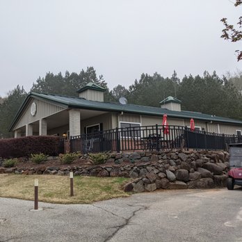 The Chimneys Golf Course - Outside the clubhouse. They have a small patio. - Golf Near Me - Winder, Georgia