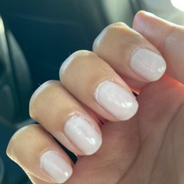 Nail salon experience, nail polish on skin and no filing was done.