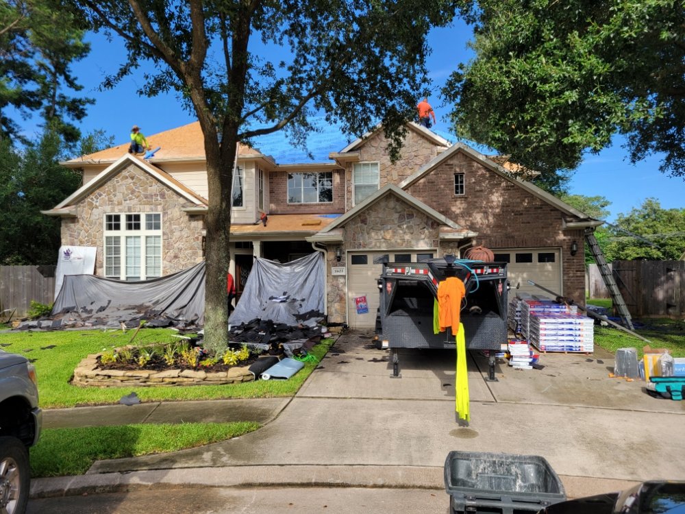 Slide of The Home Team Roofing