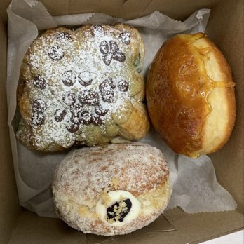 Purple Potato Bakery - Pistachio croissant.  Flan Creme brûlée brioche donut.  Blueberry cream brioche donut. - Donuts Near Me - Las Vegas, Nevada