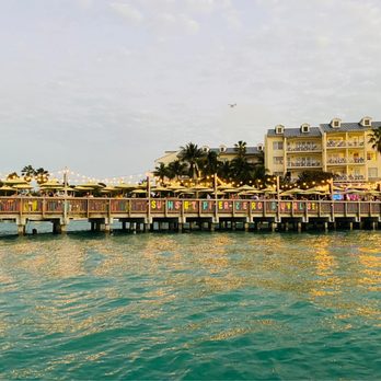 FishMonster Charters - Sunset Pier at dusk - Boat Charters Near Me - Key West, Florida FishMonster Charters - Sunset Pier at dusk - Boat Charters Near Me - Key West, Florida
