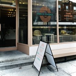 Front of the store with A-frame sign