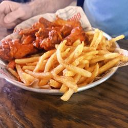 The Shack Wings & Brews - 10 TRADITIONAL WINGS combo with seasoned fries.