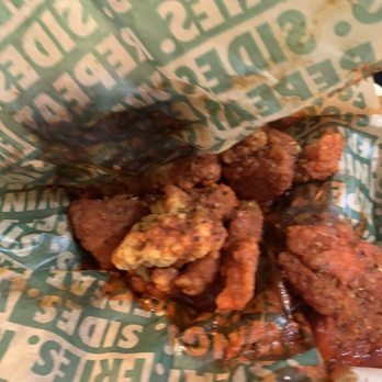 Wingstop - a close up of a wrapper of food - Chicken Wings Near Me - Tomball, Texas