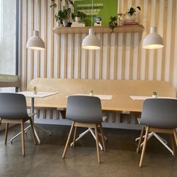 Women Run NCSD at Pure Green - Only 3 tables inside and two hanging chairs. There are two tables outside as well