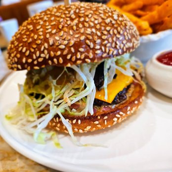 Joni Restaurant - Park Smash Burger- American cheddar, truffle sauce, pickled onion, and fries. 34 CAD. Almost too juicy, but good quality. Nice bun - Bistros Near Me - Toronto, Ontario Joni Restaurant - Park Smash Burger- American cheddar, truffle sauce, pickled onion, and fries. 34 CAD. Almost too juicy, but good quality. Nice bun - Bistros Near Me - Toronto, Ontario