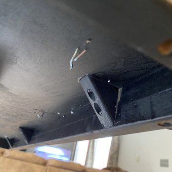 Ashley Store - Underside of table with large sharp staples left in after delivery - Furniture Stores Near Me - Oxnard, California Ashley Store - Underside of table with large sharp staples left in after delivery - Furniture Stores Near Me - Oxnard, California