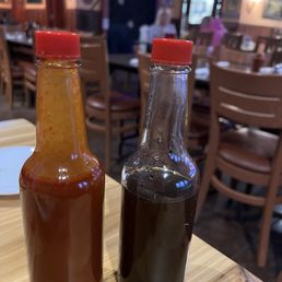 Hot Sauce. Garlic sauce. House made. Longtime recipe. Hot Sauce. Garlic sauce. House made. Longtime recipe.