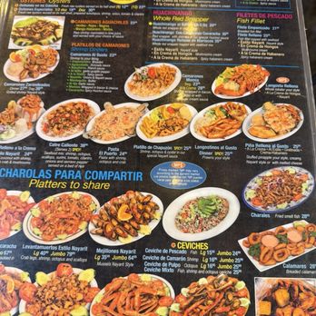 Mariscos El Puerto 2 - Menu showcases a variety of seafood dishes including shrimp, oysters, fish fillets, ceviche, and shrimp dinners. It features items like shrimp cocktail, oysters on the half shell, fish fillet, ceviche styles, and shrimp platters, with prices and detailed descriptions. The menu also highlights regional Mexican seafood specialties and includes images of some dishes, with sections for charales, ceviches, and seafood platters. - Seafood Near Me - Chicago, Illinois