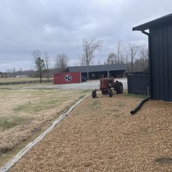 Southern Pride Distillery - Tractor on the side of the distillery.