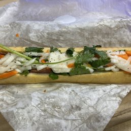 Grilled Pork Sausage baguette ($6.95) Grilled Pork Sausage baguette ($6.95)
