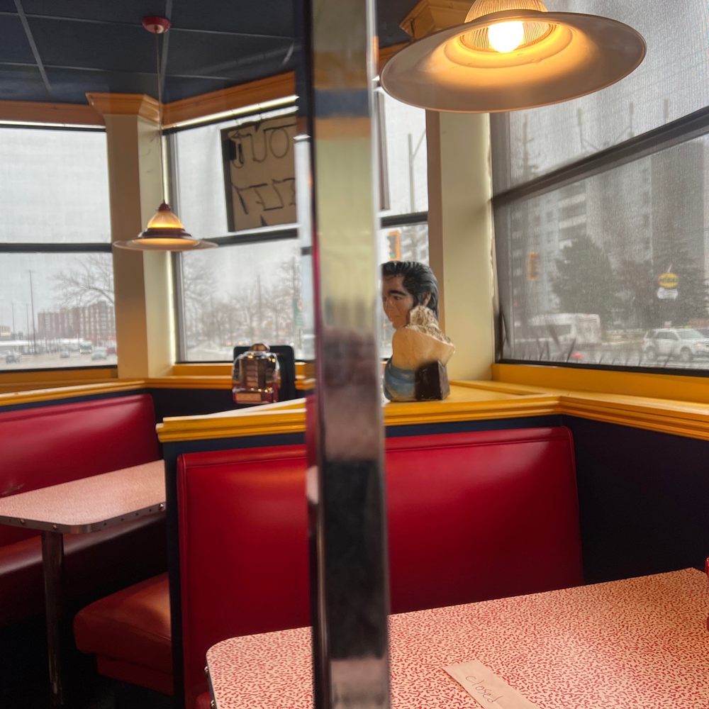 Wimpy's Diner - a woman sitting at the counter - Diners Near Me - Hamilton, Ontario Wimpy's Diner - a woman sitting at the counter - Diners Near Me - Hamilton, Ontario