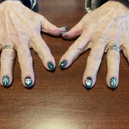 Took my Mom in to her favorite place to visit when she flies in from the east coast. She asked for a Christmas theme on her nails.