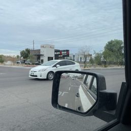 a white car in a parking lot