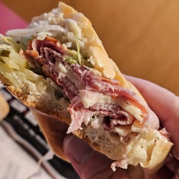 Jimmy John's - Close-up of me holding the Italian Night Club Sub while eating it - Sandwiches Near Me - Roanoke, Virginia