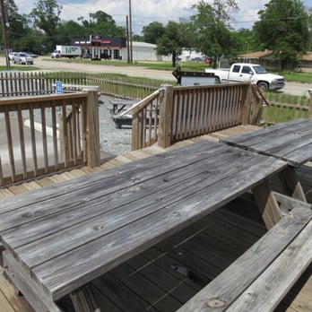 John Luke and Willie's Ice Cabin - a picnic table on the deck - Shaved Ice Near Me - West Monroe, Louisiana John Luke and Willie's Ice Cabin - a picnic table on the deck - Shaved Ice Near Me - West Monroe, Louisiana