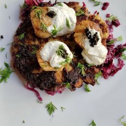 Scallops on potato latke with caviar.