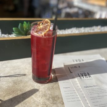 Lyra - Foxy Brown- Gin, Hibiscus, Ginger Beer (happy hour only) - Middle Eastern Near Me - Nashville, Tennessee Lyra - Foxy Brown- Gin, Hibiscus, Ginger Beer (happy hour only) - Middle Eastern Near Me - Nashville, Tennessee
