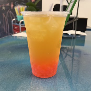 Twin Scoops - A Mango Fruit Tea with Strawberry Bubbles! - Bubble Tea Near Me - Oconomowoc, Wisconsin Twin Scoops - A Mango Fruit Tea with Strawberry Bubbles! - Bubble Tea Near Me - Oconomowoc, Wisconsin