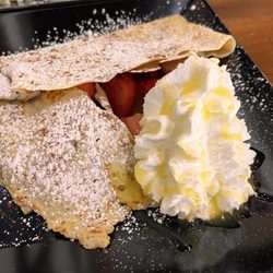 Orange crepe with strawberries