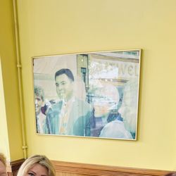 Eatwell Cafe - Poster of Muhammad Ali taken infront of Eatwell Cafe.