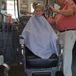 Oliver's Barber Shop - Mr. Oliver and my son.