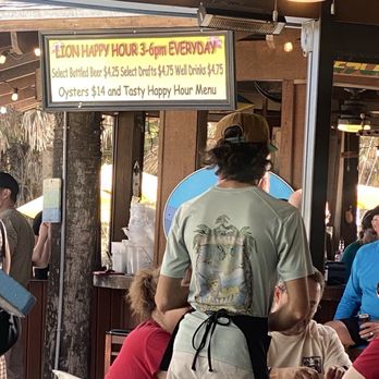 The Golden Lion Cafe - Happy hour specials are FABULOUS. eg: tower of oysters shrimp clams mussels. Specialty drinks & moc-tails, - Seafood Near Me - Flagler Beach, Florida
