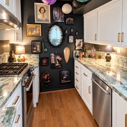 Pacific Kitchens Inc - Vintage & Modern Twist! White RTF Refacing, Bluegrass Quartzite countertops, & brushed satin brass hardware helped create customer's vision.