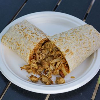 Monarca Express - a burrito on a paper plate - Food Trucks Near Me - Seattle, Washington Monarca Express - a burrito on a paper plate - Food Trucks Near Me - Seattle, Washington