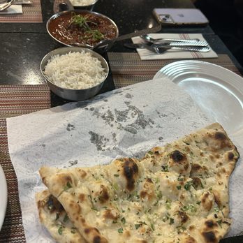 Exotica Indian Kitchen & Bar - Garlic Cilantro Naan and Lamb Rohan Josh - Indian Near Me - Charlotte, North Carolina Exotica Indian Kitchen & Bar - Garlic Cilantro Naan and Lamb Rohan Josh - Indian Near Me - Charlotte, North Carolina