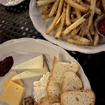 Planter's House - a plate of french fries, cheese, and bread - Cocktail Bars Near Me - Saint Louis, Missouri Planter's House - a plate of french fries, cheese, and bread - Cocktail Bars Near Me - Saint Louis, Missouri