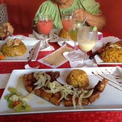 Sangría Restaurant - So delicious, great shrimp stuffed mofongo, arroz manposteao, their signature passion fruit sangria, and can-can pork chops.
