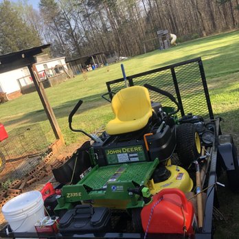 Quick Cut Lawn Care - a lawn mower, buckets, and other equipment - Lawn Services Near Me Quick Cut Lawn Care - a lawn mower, buckets, and other equipment - Lawn Services Near Me