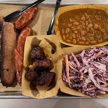 Heim Barbecue - Fatty brisket, Cheddar jalapeño sausage, Bacon burnt ends, pi to beans and cole slaw. - Barbeque Near Me - Dallas, Texas Heim Barbecue - Fatty brisket, Cheddar jalapeño sausage, Bacon burnt ends, pi to beans and cole slaw. - Barbeque Near Me - Dallas, Texas