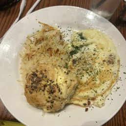 Omelette, hash browns and biscuit. Omelette, hash browns and biscuit.