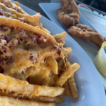 Junkanoo Below Deck - Cheesy fries - American Near Me - Fort Myers Beach, Florida Junkanoo Below Deck - Cheesy fries - American Near Me - Fort Myers Beach, Florida