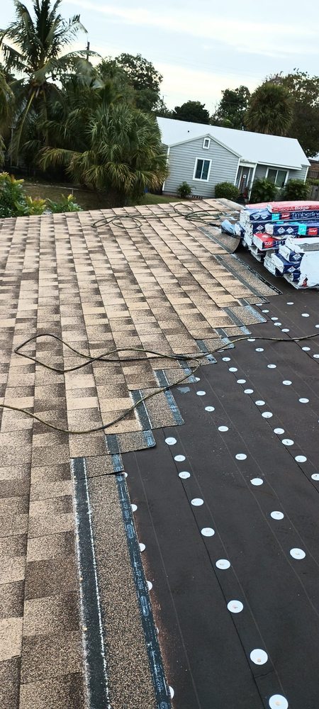 Slide of Francis Roofing Solutions