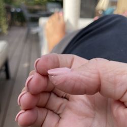 K & T Nails - Dip was too thick and glue/dip stuck under nails and on sides of fingers. Do not recommend and will not be going back.