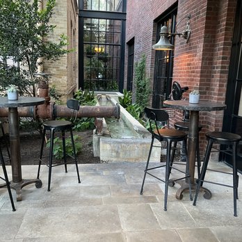 Supper - Outdoor seating at the front entrance. - New American Near Me - San Antonio, Texas Supper - Outdoor seating at the front entrance. - New American Near Me - San Antonio, Texas