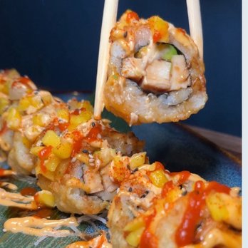 Hooked on Sushi - Carlsbad - peek under the hood of the PINEAPPLE CHICKEN roll -- not very traditional but surprisingly good - Sushi Bars Near Me - Carlsbad, California