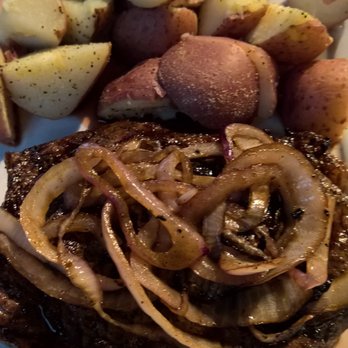 C Level - 12oz Ribeye topped with sautéed onions, new potatoes - yum - Bars Near Me - Panama City Beach, Florida C Level - 12oz Ribeye topped with sautéed onions, new potatoes - yum - Bars Near Me - Panama City Beach, Florida